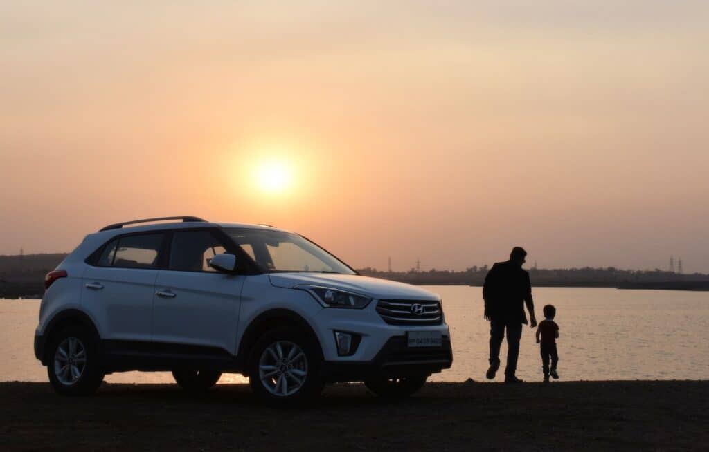 Photo by JAGMEET SiNGH https://www.pexels.com/photo/silhouette-of-man-and-child-near-white-hyundai-tucson-suv-during-golden-hour-1134857